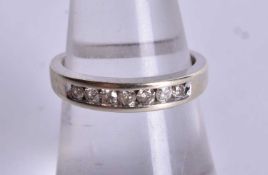 9ct white gold diamond half eternity ring. Size M, (2.3g)