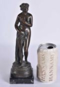A 19TH CENTURY GRAND TOUR BRONZE FIGURE OF THE BATHING VENUS. 24.5 cm high.