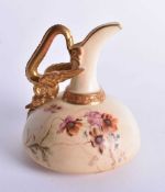 Royal Worcester ewer with dragon handled decorated with wild flowers and signed ‘ER’ date code 1892.