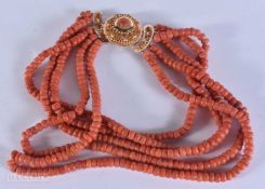 A 18CT GOLD CLASP CORAL BEAD NECKLACE. 202 grams. 40cm.