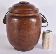 A LARGE 18TH/19TH CENTURY CHINESE CARVED WOOD JAR AND COVER Qing, possibly huanghuali. 32 cm x