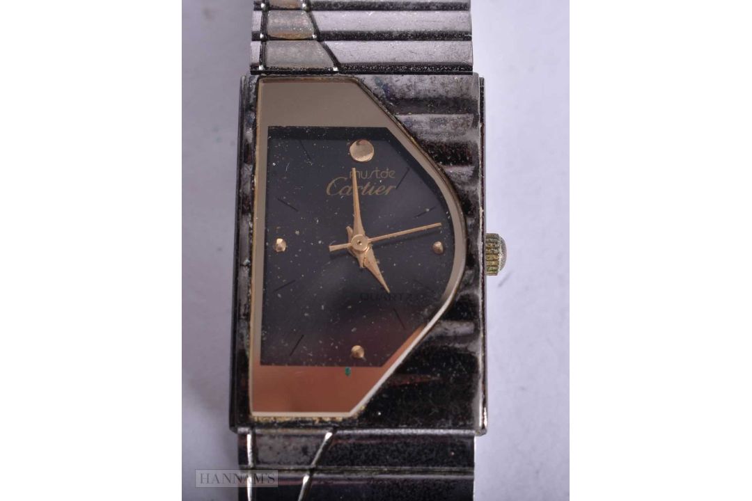 A CARTIER WRIST WATCH. Untested. 2 cm wide. - Image 1 of 3