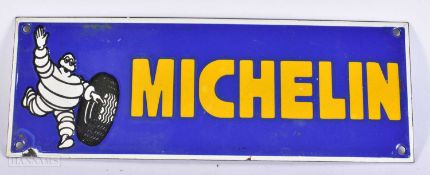 AN ENAMEL MICHELIN MAN SIGN. 30 cm x 12 cm.