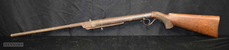 An antique air rifle. 107cm