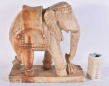A LARGE 19TH CENTURY INDIAN CARVED RAJASTHAN MARBLE ELEPHANT. 35 cm x 32 cm.