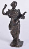 AN EARLY 18TH CENTURY BRONZE FIGURE OF A FEMALE modelled holding an open book. 12.75 cm high.