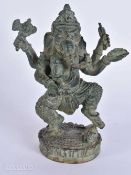 AN INDIAN BRONZE FIGURE OF GANESHA. 18 cm x 12 cm.