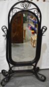 AN UNUSUAL EARLY 20TH CENTURY AUSTRIAN THONET BENTWOOD CHEVAL MIRROR. Note: Reference Christopher