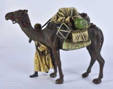 A CONTINENTAL COLD PAINTED BRONZE ARABIC CAMEL GROUP. 16 cm x 12 cm.