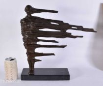 AN ABSTRACT WINDSWEPT BRONZE SCULPTURE. 40 cm x 34 cm.