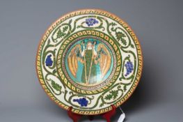 A CARLO MANZONI GRANVILLE POTTERY/MINERVA ART POTTERY CHARGER, 1896, painted in typical palette with