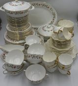 Wedgwood 'India Rose' pattern part dinner service comprising of large oblong plate (39cm), gravy boa