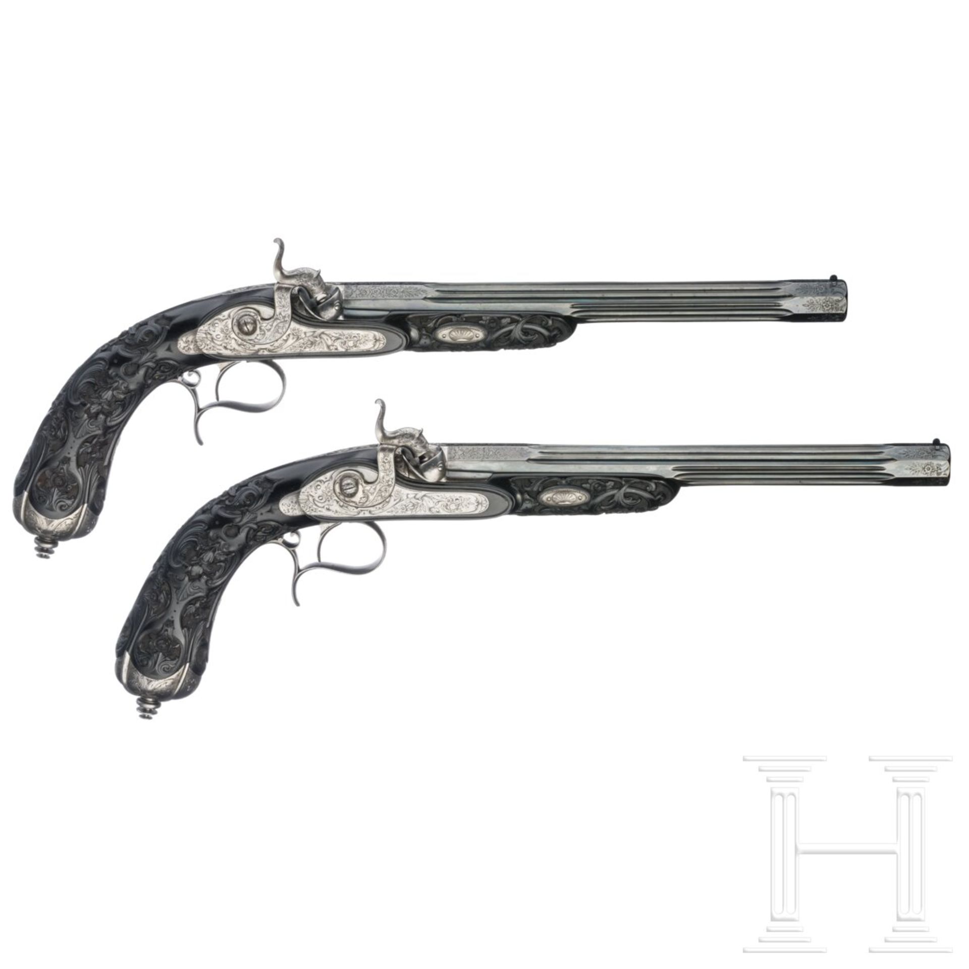 Ein hochwertiges Paar ebenholzgeschäfteter Perkussionspistolen im Kasten, Paris, um 1840/50