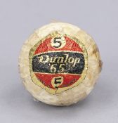 Vintage golf ball, 2nd half of the 20th century, model “5 Dunlop 65,” marked “Bubi Scholz” for the