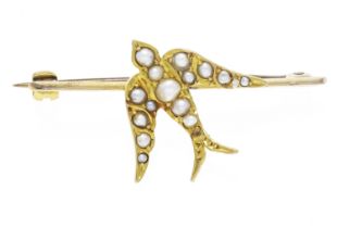 Motif brooch GG 585/000, unhallmarked, tested, in the shape of a swallow, set with cream-white