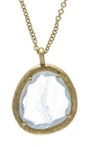 Designer pendant GG 750/000 in a matte organic shape, set with a blue topaz faceted in a flat