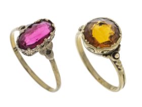 2-piece ring set, circa 1900, GG 333/000, featuring a round-faceted citrine and an oval-faceted