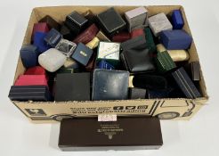 A BOX CONTAINING A GROUP OF EMPTY JEWELLERY PRESENTATION BOXES TO INCLUDE A GARRARD & CO. WATCH BOX.