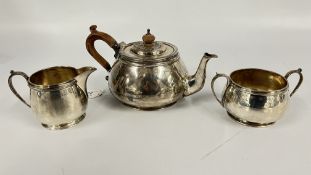 AN IMPRESSIVE SOLID SILVER THREE PIECE TEASET, LONDON 1979 MAKER E.B.