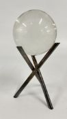 A SILVER PLATED 'X' STAND WITH FORTUNE TELLERS BALL.