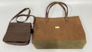 A DESIGNER BROWN LEATHER BAG MARKED 