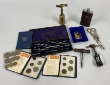 A BOX OF COLLECTIBLES TO INCLUDE CORK SCREWS, DRAWING SET, HIP FLASK,