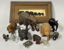 A COLLECTION OF ELEPHANT ORNAMENTS TO INCLUDE CARVED WOODEN EXAMPLES, GLASS,