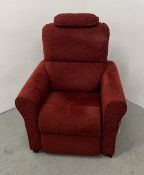 A CLARET UPHOLSTERED ELECTRIC EASY CHAIR - SOLD AS SEEN.