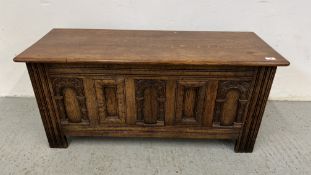 A REPRODUCTION OAK CARVED COFFER, W 114 X D 43 X H 52CM.