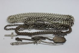 A BAG CONTAINING 3 X SILVER ROPE NECKLACES, SILVER CROSS, SILVER ID BRACELET A/F,