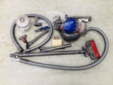 A DYSON BAGLESS BIG BALL ANIMAL 2 VACUUM + A BOX OF ACCESSORIES - SOLD AS SEEN.