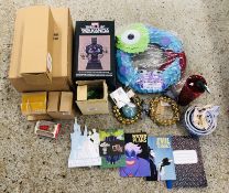 A QUANTITY OF DISNEY RELATED MERCHANDISE.