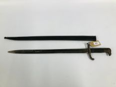 AN ANTIQUE BAYONET AND SCABBARD (POSSIBLY GERMAN) BLADE LENGTH 49CM.