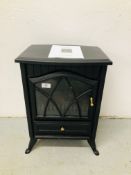 A SOLID FUEL EFFECT ELECTRIC ROOM HEATER WITH INSTRUCTIONS - SOLD AS SEEN.