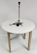 A MODERN M&S CIRCULAR DINING TABLE AND A DORMA CHROME LAMP - SOLD AS SEEN.