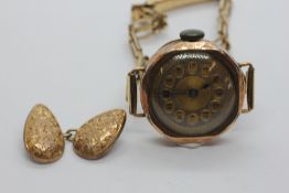 VINTAGE 9CT GOLD CASED LADIES WRIST WATCH ON ROLLED GOLD BRACELET AND SINGLE 9CT GOLD CUFF LINK.