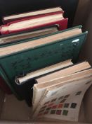 STAMPS: BOX WITH GENERAL COLLECTIONS IN NINE VARIOUS VOLUMES, SOME OLD TIME REMAINDERS, MIDDLE EAST,