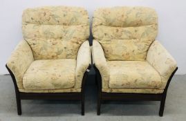 A PAIR OF COUNTRY COTTAGE ARMCHAIRS.