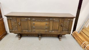 HEAVILY CARVED REPRODUCTION 4 DRAWER 2 DOOR OAK SIDEBOARD, W 187 X D 43 X H 80CM.