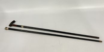 TWO VINTAGE HARDWOOD WALKING STICKS, ONE SILVER TOPPED EXAMPLE, THE OTHER SILVER BANDED.