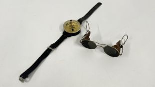 A WW2 LUFTWAFFE AK39 FI 23235-1 WRIST COMPASS AND A PAIR OF ANTI GLARE GLASSES.