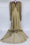 AN ART DECO HAND CRAFTED FULL LENGTH EVENING GOWN.