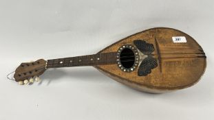 A VINTAGE MANDOLIN BEARING LABEL TITLED 