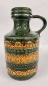 A GLAZED W. GERMAN HANDLED VASE H 39CM.