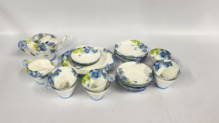 A DECORATIVE 42 PIECE REPLICA OF SERVICE TEA SET PRODUCED FOR HER MAJESTY QUEEN MARY BY PARAGON