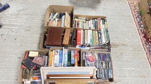 7 BOXES OF AS CLEARED BOOKS, CD'S, GAMES, RECORDS ALONG WITH 7 FRAMED PRINTS AND MIRRORS.