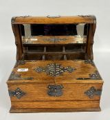 AN ANTIQUE OAK TANTALUS / CIGAR BOX WITH SILVER PLATED MOUNTS, W 35 X D 26.5 X H 32CM.