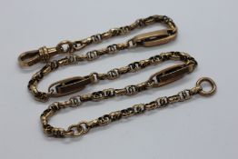 A FANCY LINK WATCH CHAIN MARKED 9 CT