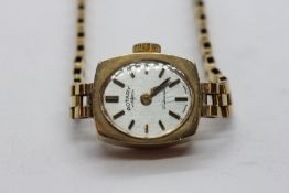 A 9CT GOLD CASED LADIES ROTARY WRIST WATCH WITH 21 JEWEL MANUAL MOVEMENT ON 9CT GOLD BRACELET.