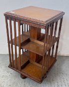 A VINTAGE REVOLVING BOOKCASE, 39 X 39 X H 65CM.